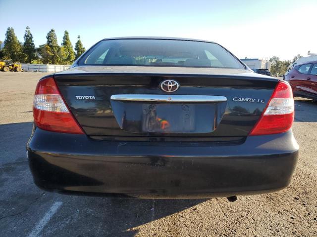 JTDBE32K020098315 - 2002 TOYOTA CAMRY LE 黑色 照片 6