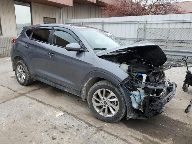 KM8J23A40GU041602 - 2016 HYUNDAI TUCSON SE GRAY photo 4