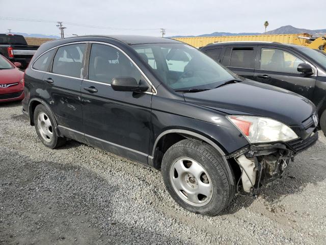 5J6RE38399L027289 - 2009 HONDA CR-V LX BLACK photo 4