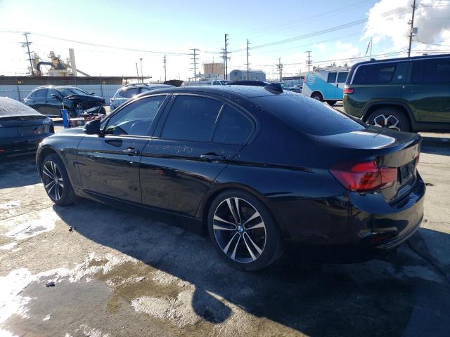 WBA8B9C55JAE22401 - 2018 BMW 330 I Schwarz Foto 2