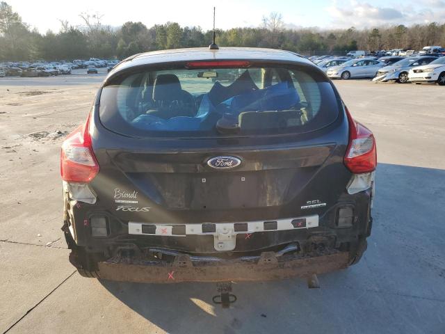 1FAHP3M26CL395533 - 2012 FORD FOCUS SEL BLACK photo 6