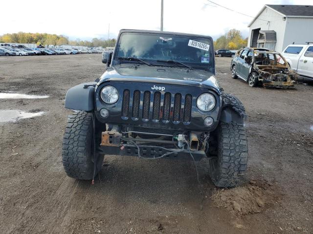 1C4BJWDG0FL509674 - 2015 JEEP WRANGLER U SPORT შავი ფოტო 5