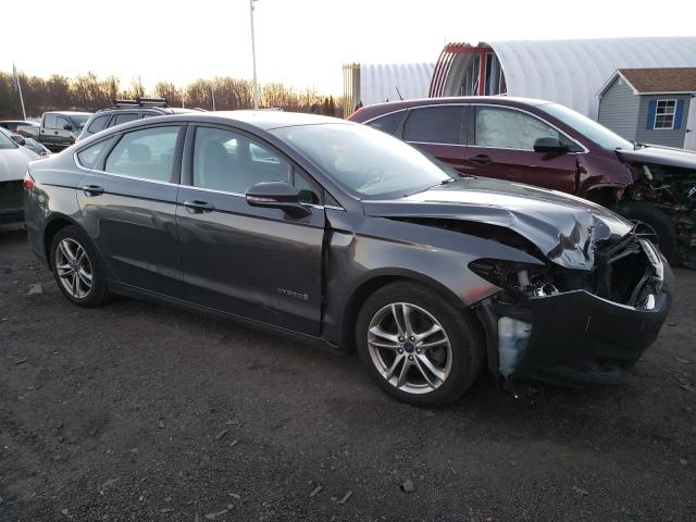 3FA6P0LU8GR108306 - 2016 FORD FUSION SE HYBRID GRAY photo 4