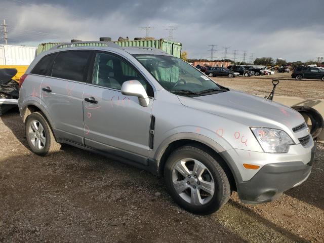3GNAL2EK0ES585445 - 2014 CHEVROLET CAPTIVA LS SILVER photo 4