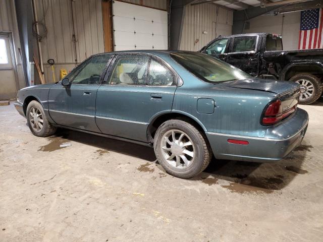 1G3HN52K0V4800068 - 1997 OLDSMOBILE 88 BASE GREEN photo 2