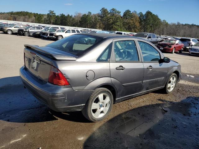 1FAHP34N07W182883 - 2007 FORD FOCUS ZX4 GRAY photo 3