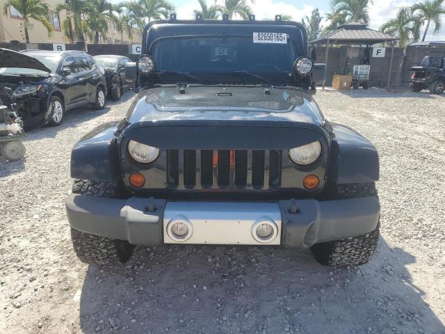 1J4GA5D16BL550388 - 2011 JEEP WRANGLER SAHARA შავი ფოტო 5