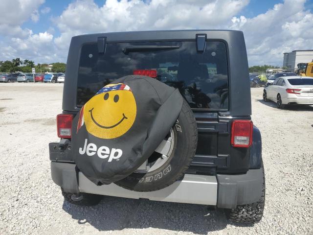 1J4GA5D16BL550388 - 2011 JEEP WRANGLER SAHARA შავი ფოტო 6