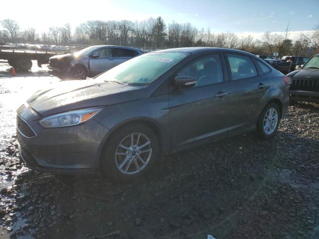 1FADP3F22HL335896 - 2017 FORD FOCUS SE GRAY photo 1