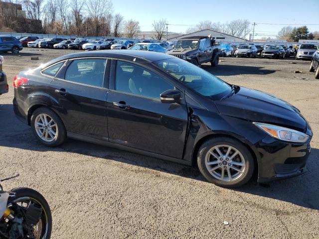 1FADP3F22FL338200 - 2015 FORD FOCUS SE BLACK photo 4