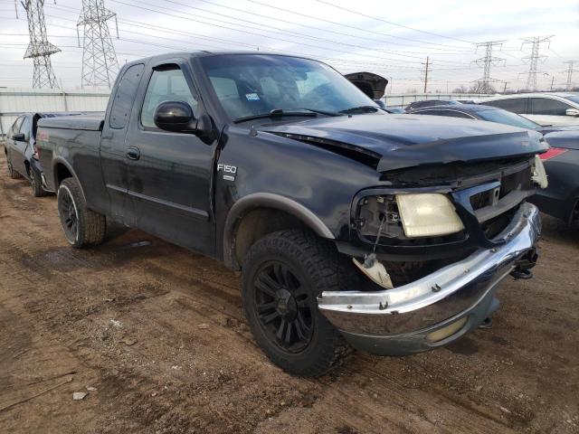 2FTRX18L42CA38690 - 2002 FORD F150 BLACK photo 4