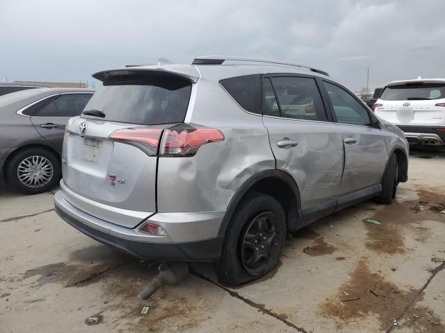 2T3ZFREV9HW314932 - 2017 TOYOTA RAV4 LE SILVER photo 3