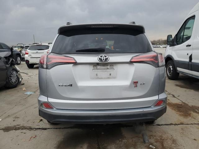 2T3ZFREV9HW314932 - 2017 TOYOTA RAV4 LE SILVER photo 6