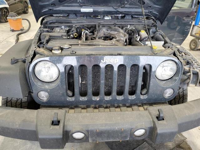 1C4BJWDG3JL874973 - 2018 JEEP WRANGLER U SPORT فحمي صورة 11