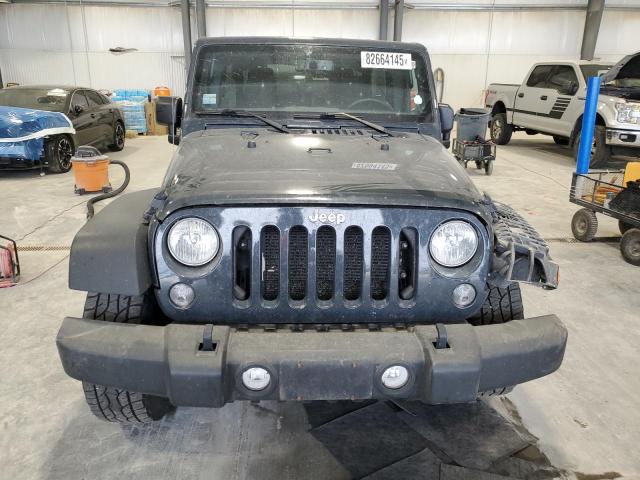 1C4BJWDG3JL874973 - 2018 JEEP WRANGLER U SPORT فحمي صورة 5