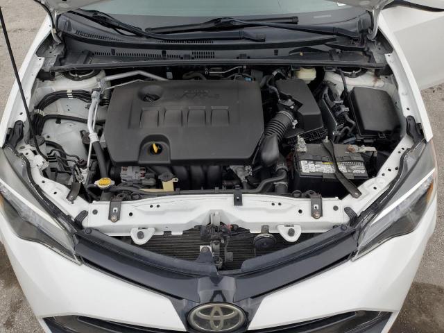 5YFBURHE2HP584629 - 2017 TOYOTA COROLLA L WHITE photo 11