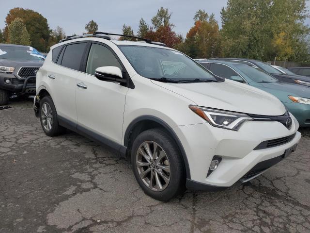 JTMDFREV5JD257447 - 2018 TOYOTA RAV4 LIMITED أبيض صورة 4