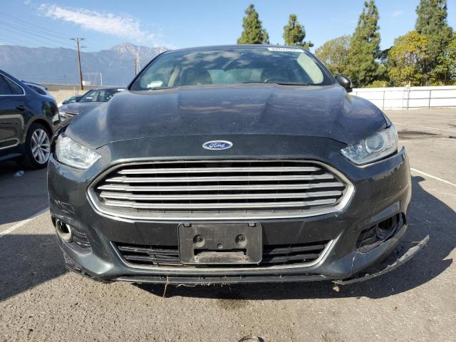 3FA6P0SU8GR194539 - 2016 FORD FUSION TITANIUM PHEV BLUE photo 5