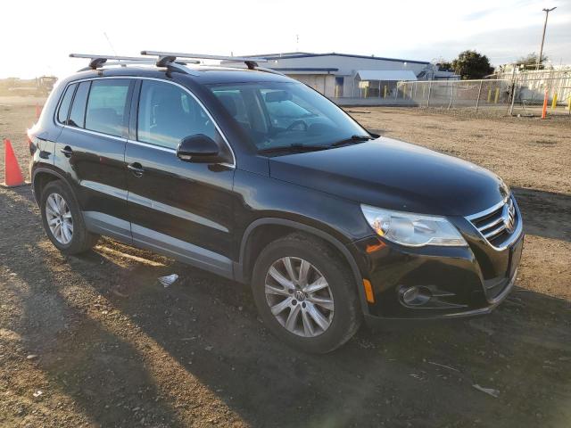 WVGAV75N69W532183 - 2009 VOLKSWAGEN TIGUAN S BLACK photo 4