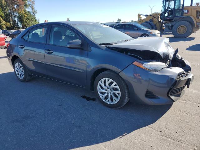 5YFBURHE9HP578875 - 2017 TOYOTA COROLLA L GRAY photo 4