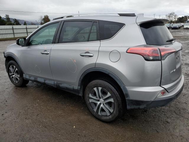 2T3ZFREV7GW236858 - 2016 TOYOTA RAV4 LE SILVER photo 2