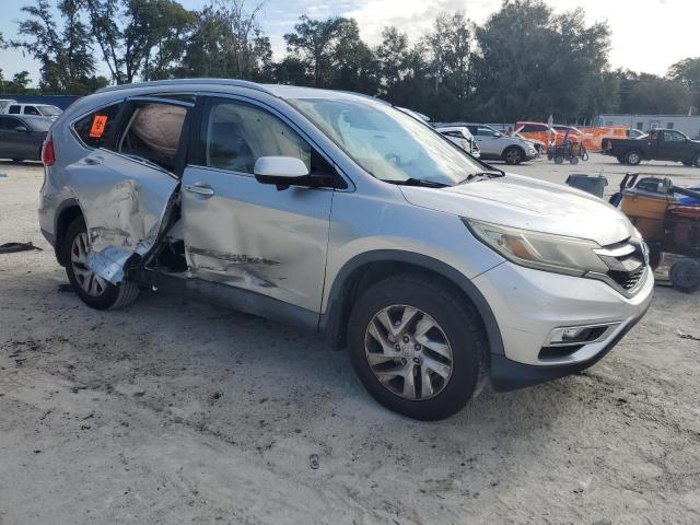 2HKRM3H79FH531868 - 2015 HONDA CR-V EXL SILVER photo 4