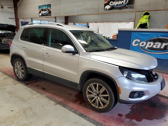 WVGAV3AX5EW528507 - 2014 VOLKSWAGEN TIGUAN S SILVER photo 4