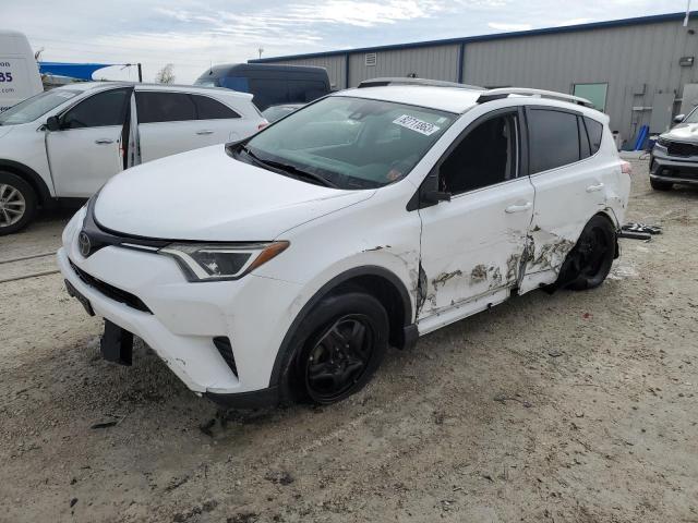 2T3ZFREV3HW356349 - 2017 TOYOTA RAV4 LE WHITE photo 1