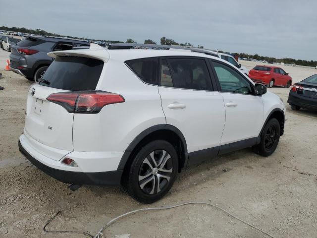 2T3ZFREV3HW356349 - 2017 TOYOTA RAV4 LE WHITE photo 3