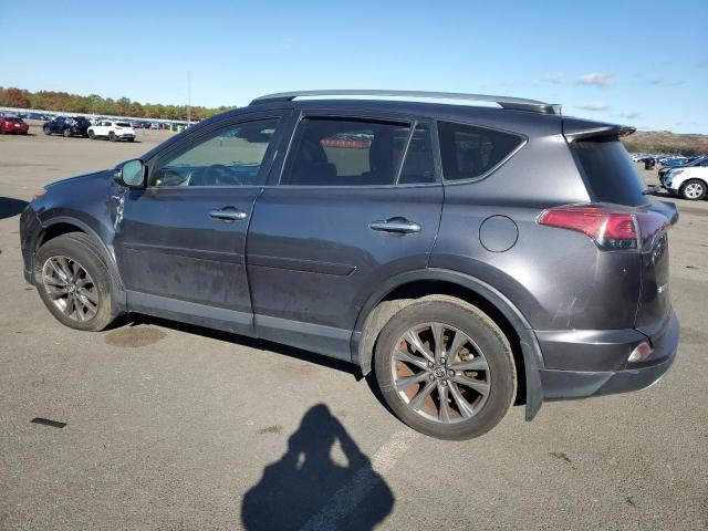 JTMDFREV2JJ736927 - 2018 TOYOTA RAV4 LIMITED Gris photo 2