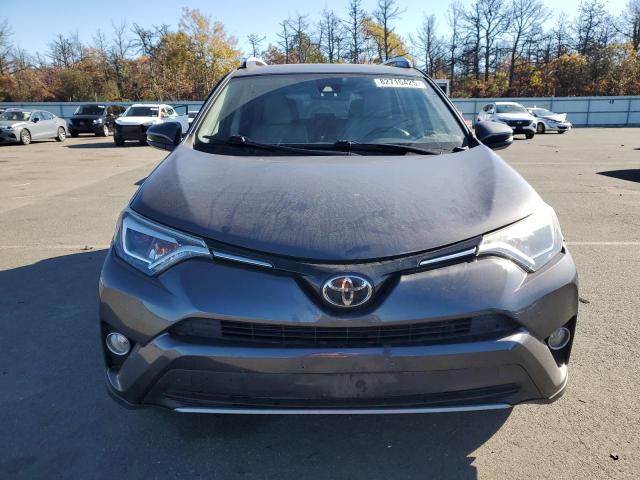 JTMDFREV2JJ736927 - 2018 TOYOTA RAV4 LIMITED Gris photo 5