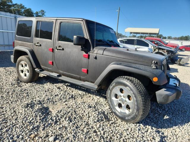 1C4BJWEG5EL222778 - 2014 JEEP WRANGLER U SAHARA BLACK photo 4