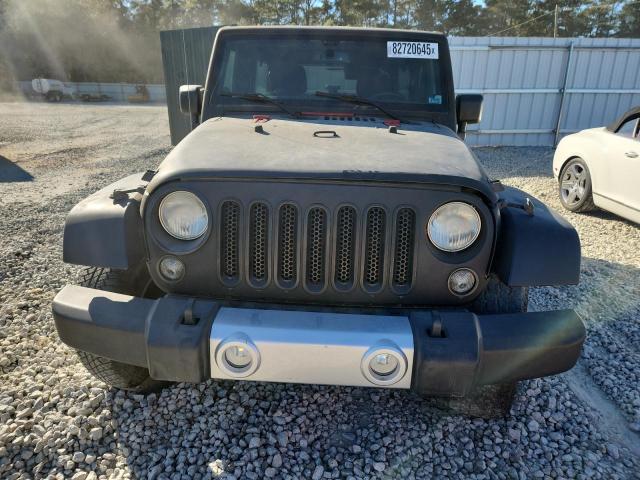 1C4BJWEG5EL222778 - 2014 JEEP WRANGLER U SAHARA BLACK photo 5