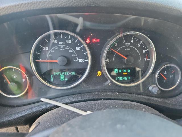 1C4BJWEG5EL222778 - 2014 JEEP WRANGLER U SAHARA BLACK photo 9