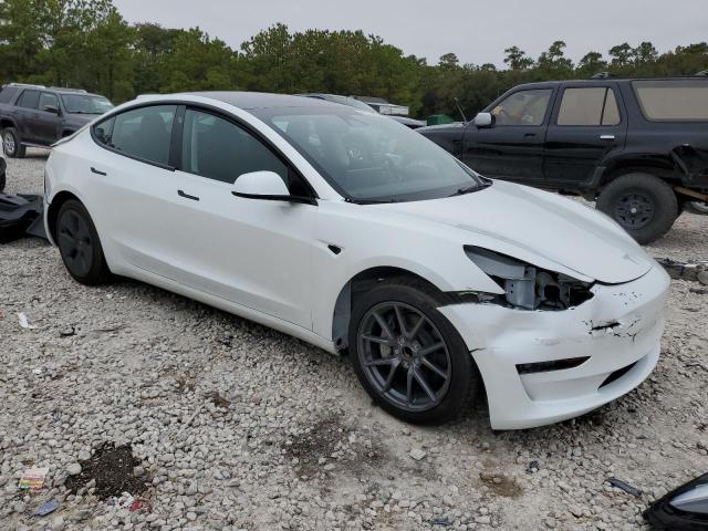 5YJ3E1EA4PF588874 - 2023 TESLA MODEL 3 WHITE photo 4