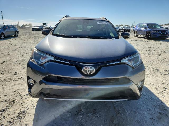 JTMWFREV5HD101170 - 2017 TOYOTA RAV4 XLE ნაცრისფერი ფოტო 5