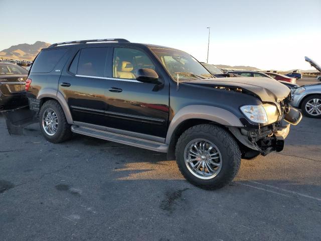5TDZT34A02S105642 - 2002 TOYOTA SEQUOIA SR5 BLACK photo 4