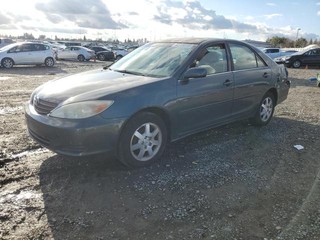 JTDBE32K330154636 - 2003 TOYOTA CAMRY LE GREEN photo 1