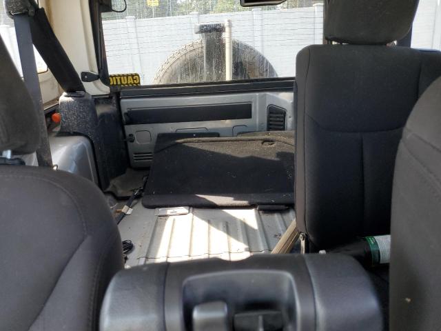 1C4BJWDG7FL690062 - 2015 JEEP WRANGLER U SPORT SILVER photo 10