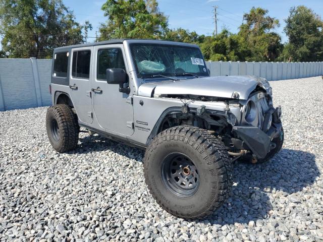 1C4BJWDG7FL690062 - 2015 JEEP WRANGLER U SPORT SILVER photo 4