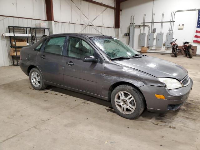 1FAFP34N87W104536 - 2007 FORD FOCUS ZX4 GRAY photo 4