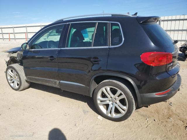 WVGAV7AX8DW548868 - 2013 VOLKSWAGEN TIGUAN S შავი ფოტო 2