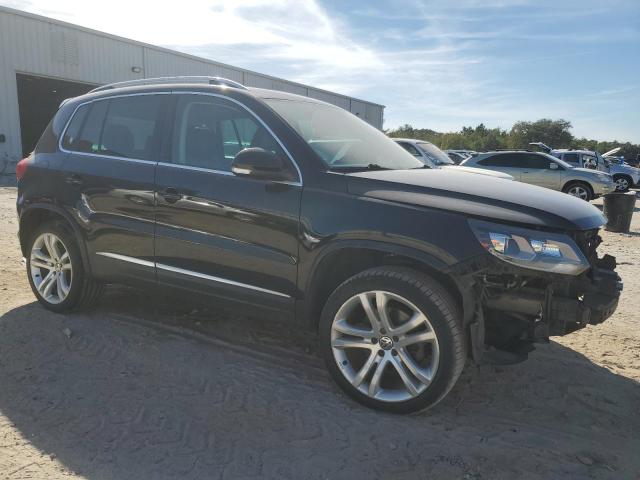 WVGAV7AX8DW548868 - 2013 VOLKSWAGEN TIGUAN S შავი ფოტო 4