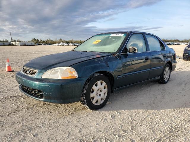 2HGEJ667XWH554565 - 1998 HONDA CIVIC LX GREEN photo 1