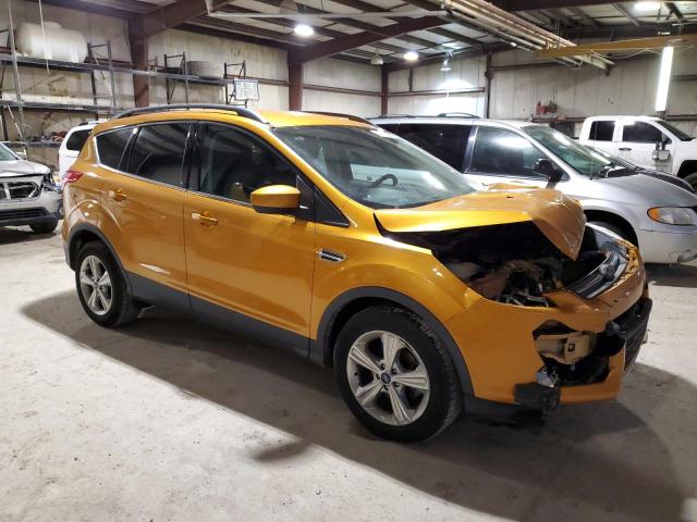 1FMCU0GX7GUA08311 - 2016 FORD ESCAPE SE ORANGE photo 4