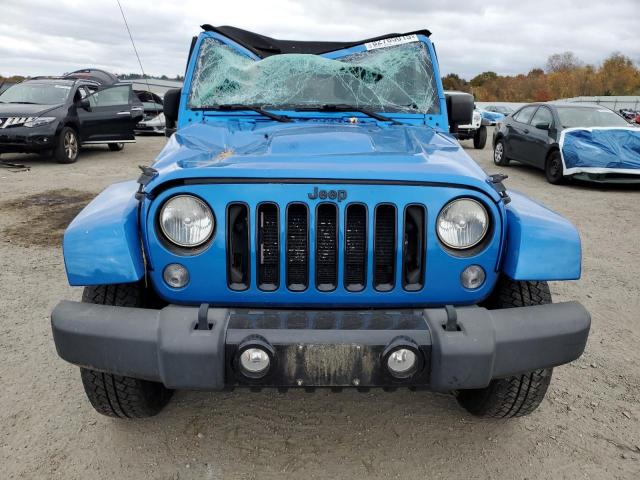 1C4HJWEG5EL224945 - 2014 JEEP WRANGLER U SAHARA Синій фото 5