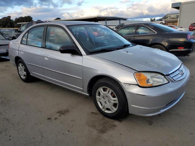 1HGES16582L049538 - 2002 HONDA CIVIC LX SILVER photo 4