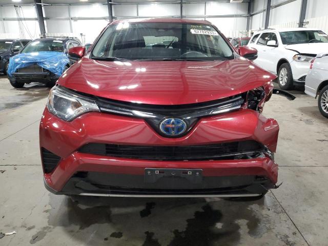 JTMRJREV6JD189793 - 2018 TOYOTA RAV4 HV LE RED photo 5