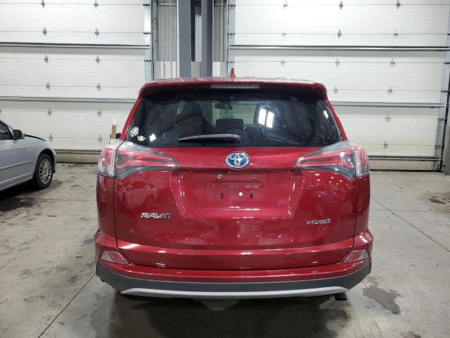 JTMRJREV6JD189793 - 2018 TOYOTA RAV4 HV LE RED photo 6