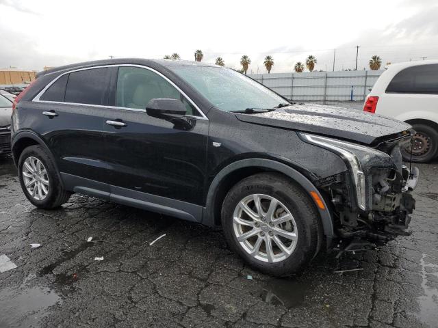 1GYAZAR42KF116087 - 2019 CADILLAC XT4 LUXURY BLACK photo 4